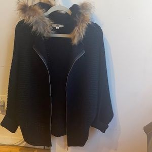 *Worn once* Chunky knit black zip up sweater with faux fur hood trim